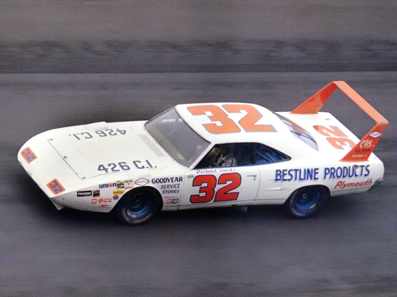 32 1970-Plymouth-Road-Runner-Superbird-NASCAR-Race-Car-at-Speed-Driven-by-Dick-Brooks-White-fsv.jpg