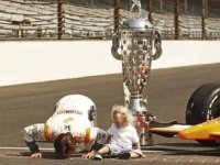 dan-wheldon-kissing-the-bricks-after-winning-the-indy-500.jpg